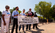 Ben Jealous of People for the American Way speaks during a civil disobedience action, part...