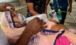 Relative transports a Covid-19 patient at Dhaka Medical Collage and Hospital for admission...