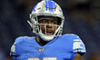 Detroit Lions running back Godwin Igwebuike (35) looks down the field after a play during...