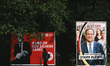 Placards of top candidates of upcoming Bundestag Election are seen in Cologne, Germany on...