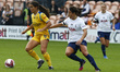 L-R Brooke Chaplen of Reading FC Women holds of Maeva Clemaron of Tottenham Hotspur Women...
