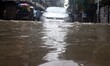The water luggage’s KOlkata Amar Street    under heavy rain from Cyclone Komen in Kolkata...