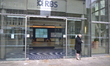 A person standing outside a central Manchester branch of the Royal Bank of Scotland on Tue...