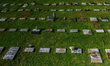 Residents of Antipolo City, Philippines visit the tomb of their loved ones inside cemeteri...