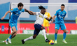 Aleksandr Erokhin (L) and Douglas Santos (R) of Zenit St. Petersburg vie for the ball with...