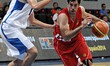 Iran's Samad Nikkhah Bahrami (R) tries to get past South Korea's Jonghyun Lee during their...