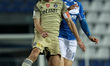 Massimiliano Mangraviti (Brescia Calcio) and Robert Gucher (AC Pisa 1909) fight for the ba...
