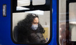 A passengers of the public transport wears a face mask during the fourth wave of the coron...