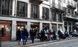 Queue at a pharmacy to purchase rapid test pads for covid-19. The new wave with the Omicro...