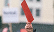 a red card is seen from a counter anti vaccine protesters  during the Anti vaxxers  weekly...