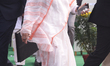 West Bengal Chief Minister Mamata Banerjee walks along a street during the Republic Day pa...