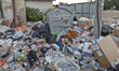 Hundreds of kilograms of garbage left by migrants who are awaiting to enter the transfer c...
