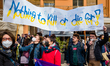 Protesters protest with placards in the square in front of the Municipality of Bari agains...