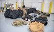 Volunteers with the Ukrainian-American Crisis Response Committee pack field medic bags on...