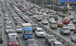 View of a road bursting with vehicles in Harbin city of China ,on World Car Free Day,22 Se...