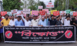 Activists of All Guwahati Students Union and AASU stage a protest over the price hike of L...