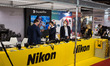 People are looking on a Nikon kiosk during the PhotoVision Festival 2022, a 3-day big fest...