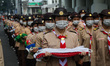 Scout members march during the 67th anniversary of the Asian African Conference on April 1...