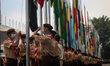 Scout members raise the flag of the Asian-African conference members on April 18, 2022, at...