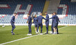 Hartlepool players inspecting the pitch during the Sky Bet League 2 match between Rochdale...