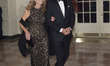 Brian Roberts, Chairman and CEO, Comcast NBC/ Universal Corporation and Aileen Roberts arr...