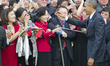 United States President Barack Obama greets guests during an official State Arrival ceremo...