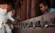 A man tries to check the water supply from a Tap on a hot summer day in the premises of Ja...