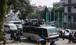 October 2, 2015, Kathmandu, Nepal -- Passengers ride on top of overcrowded public bus as l...