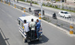 October 2, 2015, Kathmandu, Nepal -- Passengers ride on top of overcrowded public bus as l...