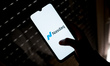In this photo illustration a Nasdaq logo seen displayed on a smartphone screen in Athens,...