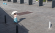 A woman with a parasol waits for her friend at seaside urban area in Yokohama, Japan on 27...