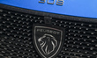 A Peugeot logo seen on a parked Peugeot 308 car in Krakow city center. On Tuesday, June 0...