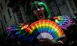 Members of the LGBT community take part in the parade'Peace and Love' to mark pride day 20...