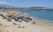 Tourism in Greece. The coast of Rethymno town with the long sandy beach and the beach bars...