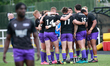 Thunder players form a huddle during the warm-up for the BETFRED Championship match betwee...