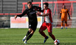Barrow's Ritchie Bennett tussles with Ashton's Matty Regan  during the Pre-season Friendly...
