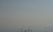 The Harbin City is covered by smog. on Oct. 22, 2015. 
 