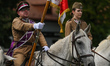 Participants of the march in the costumes of the First Cadre Company (Polish: Pierwsza Kom...