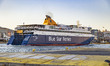 Blue Star Paros, the ferry of Blue Star Ferries is entering and docking at the Port of Pir...