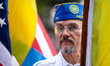 A Ukrainian-American military veteran is part of a color guard at a rally celebrating Ukra...