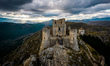 A drone view of the Castle of Rocca Calascio, Italy on September 2, 2022. At an elevation...