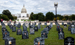 Headstones of individuals lost to opioid use form a cemetery in front of the US Capitol....