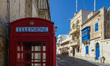 Historical old red London-style telephone box is seen in Dingli, Malta on 24 September 202...