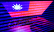 Flag of Taiwan displayed on a laptop screen and binary code displayed on a screen are seen...