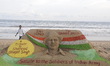 A sand sculpture of Saheed Bhagat Singh is seen at the Bay of Bengal Sea's Puri beach on h...