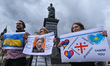 Members of the local Russian diaspora in Krakow are seen during a silent anti-war demonstr...
