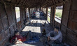 Male asylum seekers as seen in abandoned old train carriages near Thessaloniki city on the...