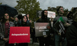 People gathered for a rally called by the far-right organization 'Institut pour la Justice...