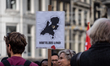 Protesters at Dam square: give refugees a dignified reception , in Amsteredam, Netherlands...