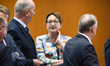 German Minister for Living, Construction and Urban Development Klara Geywitz (C) is seen b...